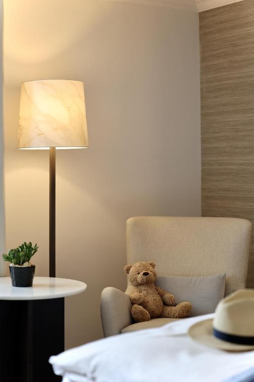 Postel nebo postele na pokoji v ubytování Grand Hotel des Bains Kempinski
