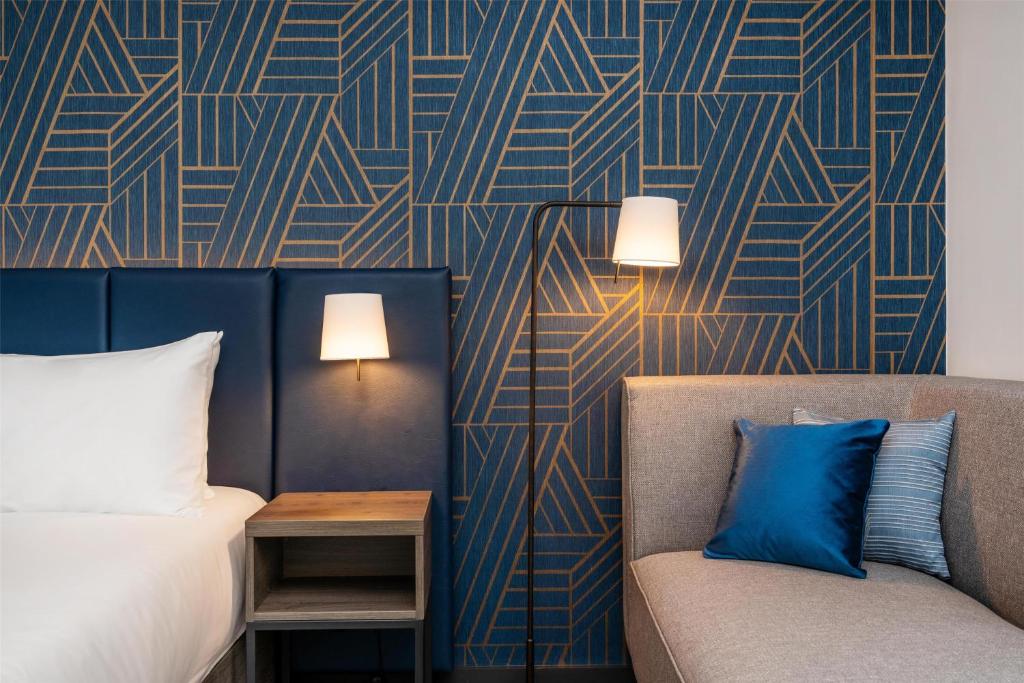 Postel nebo postele na pokoji v ubytování Hyatt Place Leeds