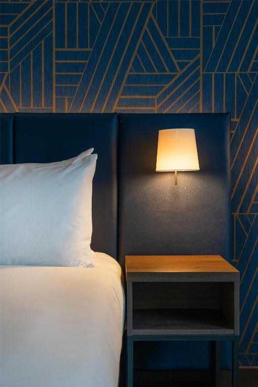 Postel nebo postele na pokoji v ubytování Hyatt Place Leeds