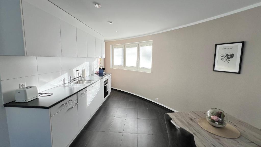 Kuchyň nebo kuchyňský kout v ubytování Modern appartment