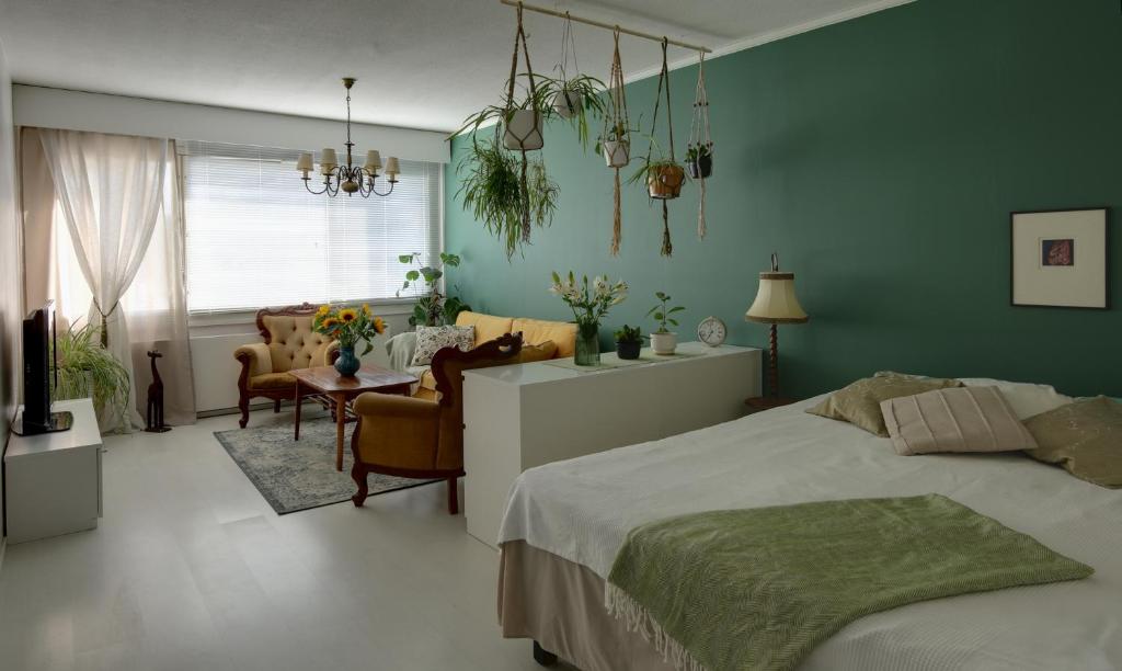 Ένα ή περισσότερα κρεβάτια σε δωμάτιο στο Casa Kaisa,cozy one-bedroom apartment, free parking