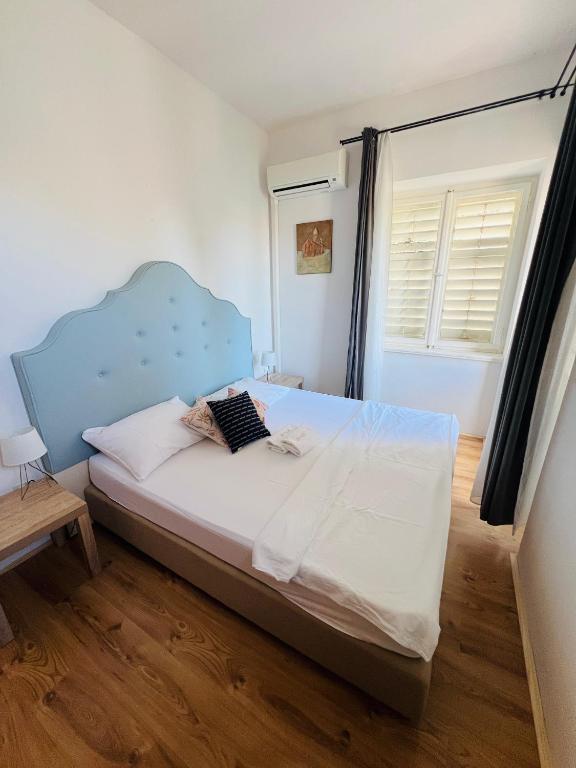 Postel nebo postele na pokoji v ubytování Villas Arbia - Rio by the Beach
