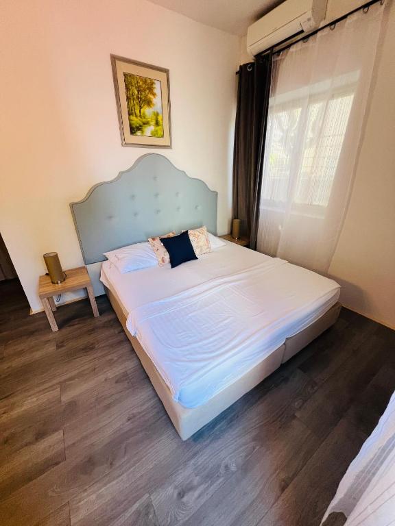 Postel nebo postele na pokoji v ubytování Villas Arbia - Rio by the Beach