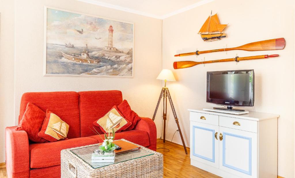 TV a/nebo společenská místnost v ubytování Hotel Friese