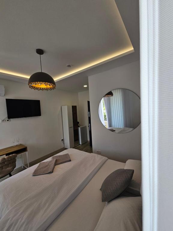 Postel nebo postele na pokoji v ubytování La Vida Apartments