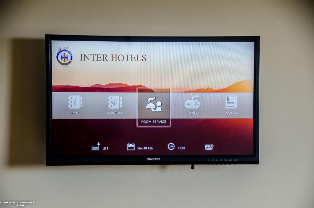 TV a/nebo společenská místnost v ubytování Hotel Inter Tete