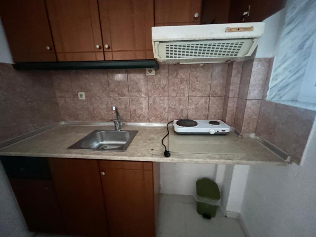 Kuchyň nebo kuchyňský kout v ubytování SIROS HOTEL
