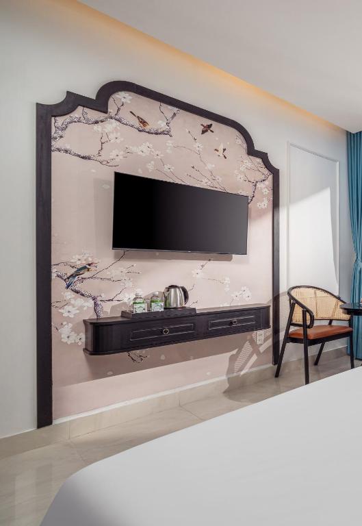 TV/trung tâm giải trí tại ELC Boutique Hoi An Hotel