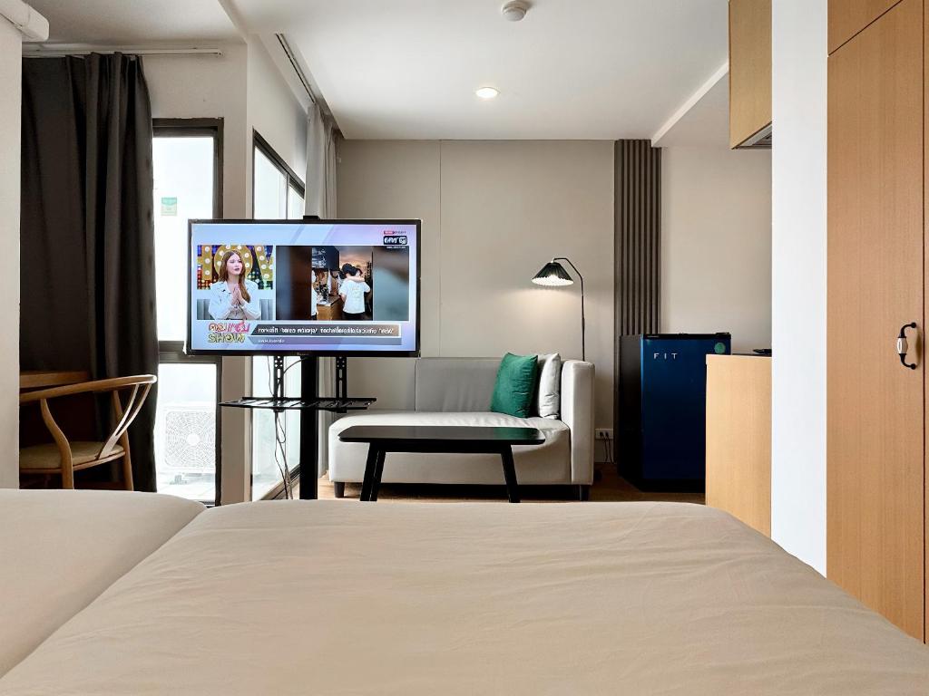 Ένα ή περισσότερα κρεβάτια σε δωμάτιο στο Pentafield City Residence