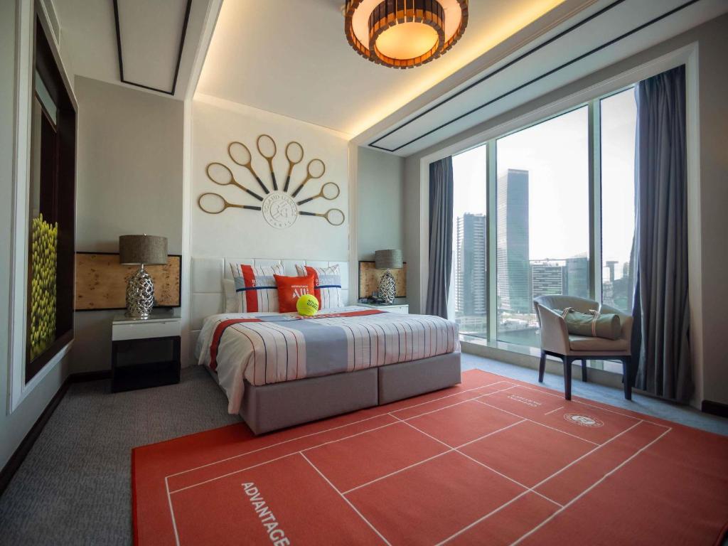 Postel nebo postele na pokoji v ubytování Pullman Dubai Downtown