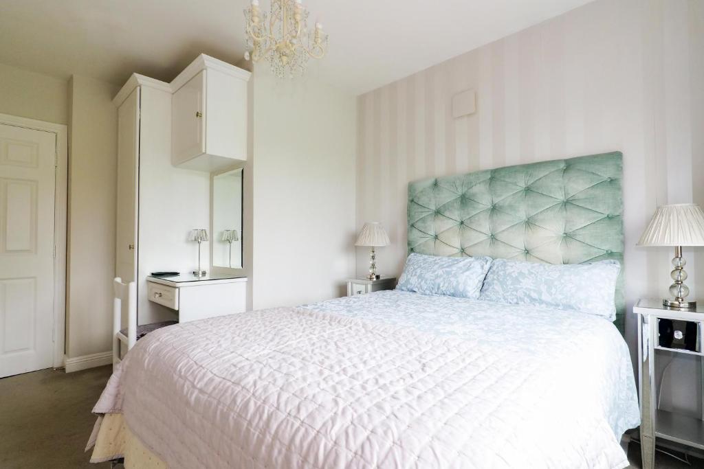 Postel nebo postele na pokoji v ubytování Sea Mist Guesthouse