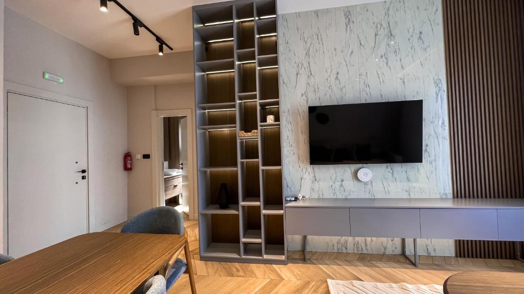 TV a/nebo společenská místnost v ubytování Apart hotel Emiia