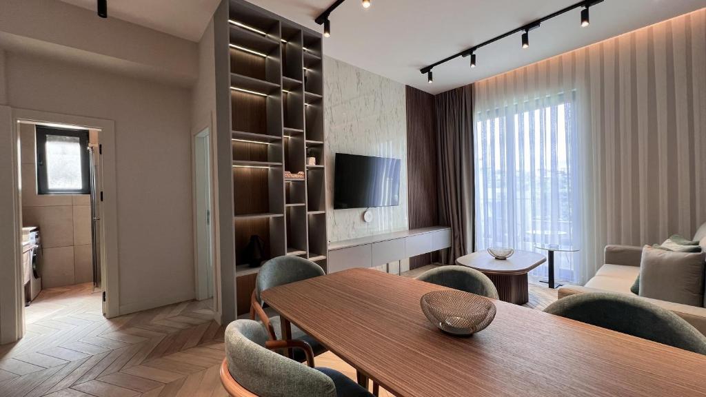 TV a/nebo společenská místnost v ubytování Apart hotel Emiia
