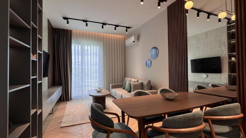 TV a/nebo společenská místnost v ubytování Apart hotel Emiia