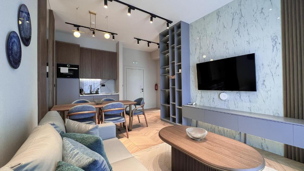 TV a/nebo společenská místnost v ubytování Apart hotel Emiia