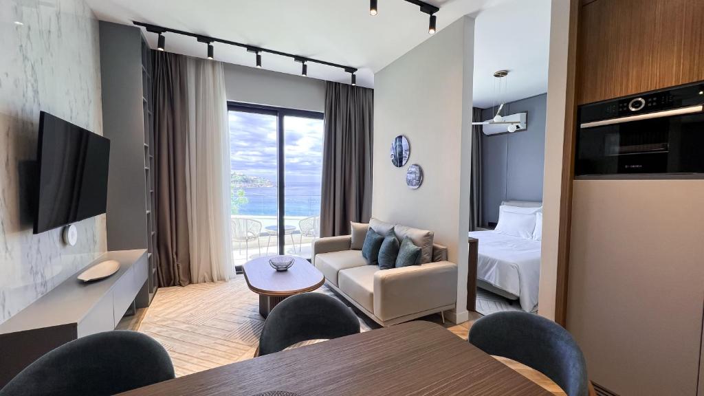 TV a/nebo společenská místnost v ubytování Apart hotel Emiia