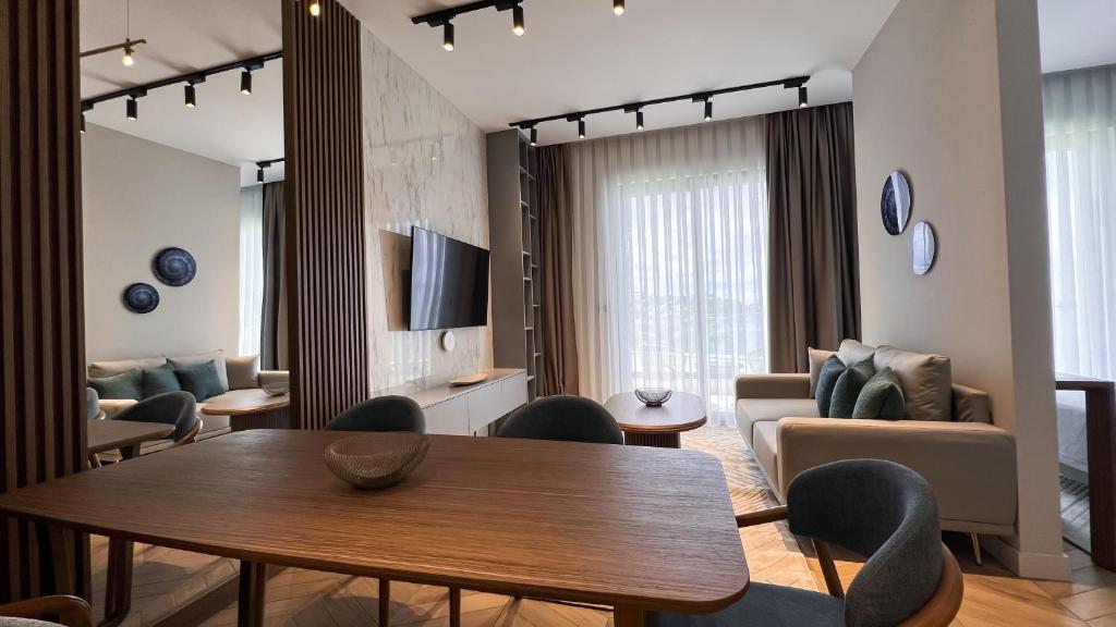 TV a/nebo společenská místnost v ubytování Apart hotel Emiia