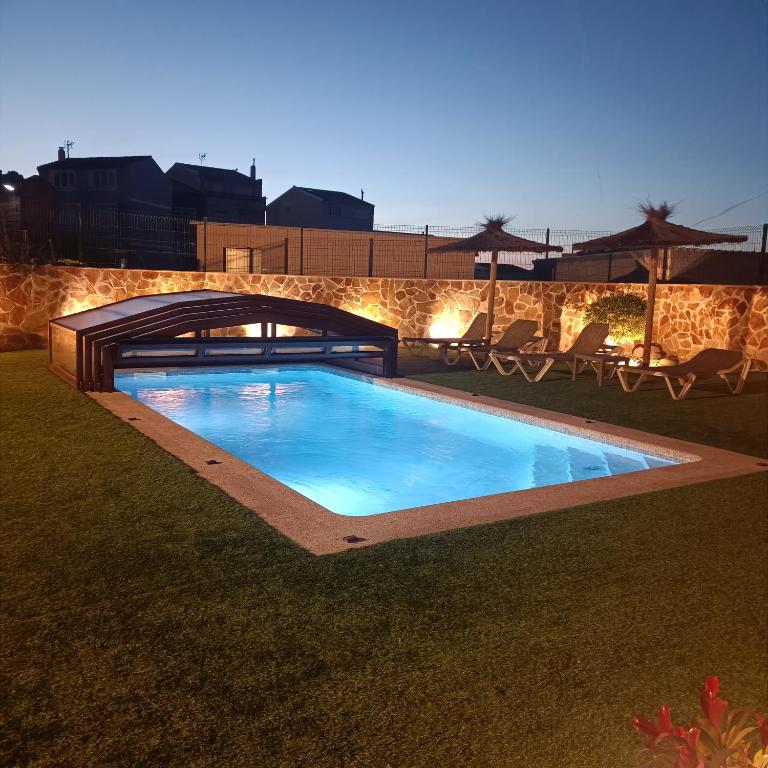 Bazén v ubytování Casa El Rincón de Alberto con Piscina CLIMATIZADA y Calefacción nebo v jeho okolí