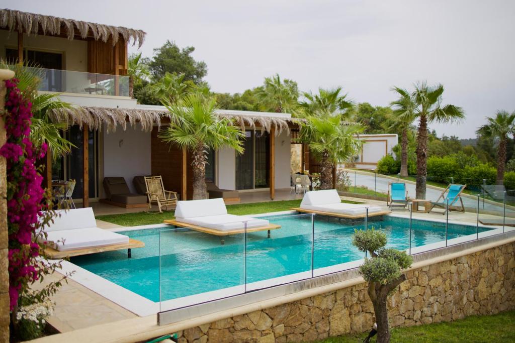 an image of a villa with a swimming pool at SANIMAR By Mono Alex in Kassandra