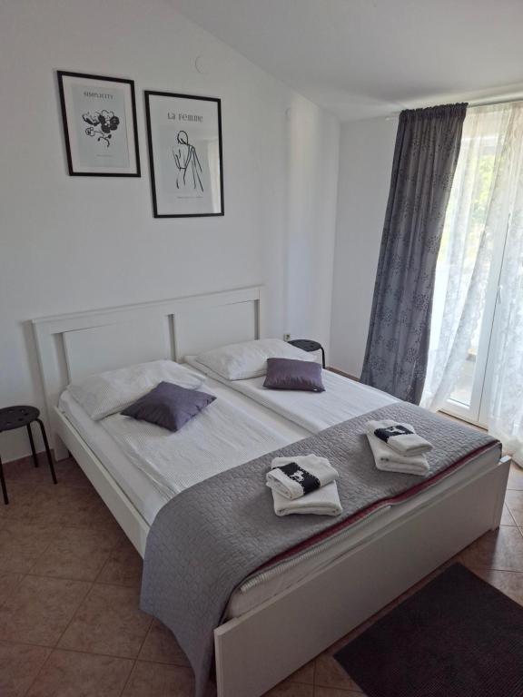 Postel nebo postele na pokoji v ubytování Martina Guest house