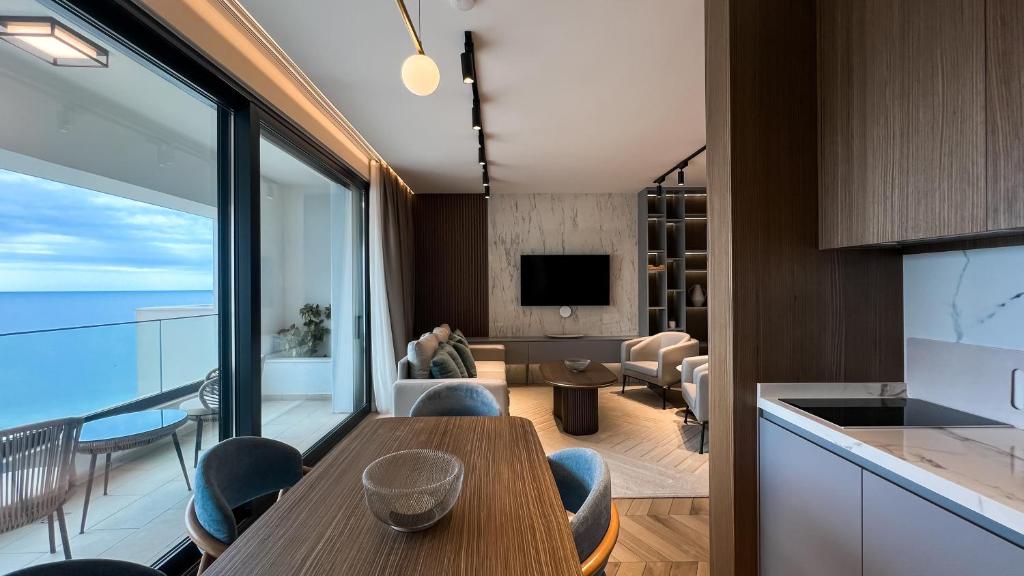 TV a/nebo společenská místnost v ubytování Apart hotel Emiia
