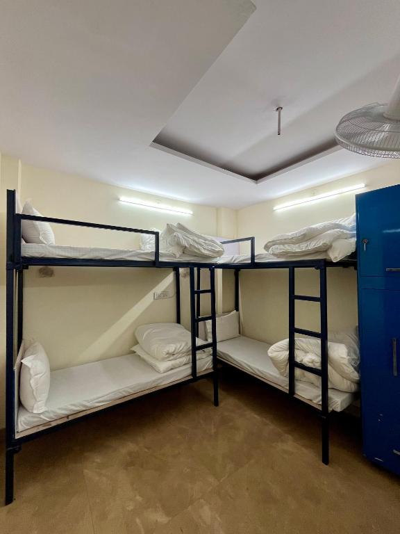 Postel nebo postele na pokoji v ubytování Back Stayz Delhi