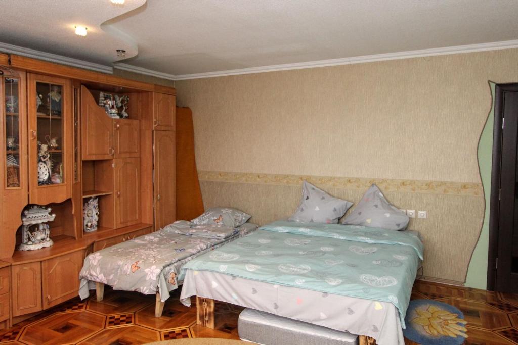 Postel nebo postele na pokoji v ubytování Будинок "Змерега"