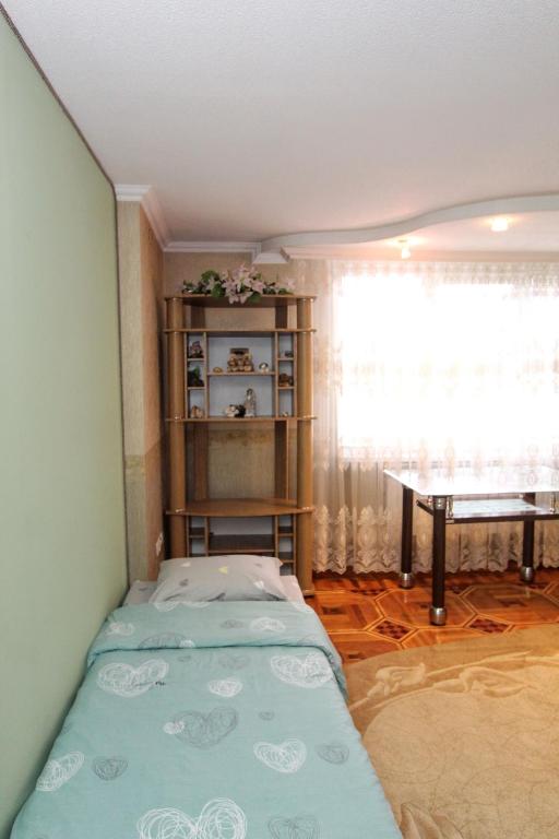Postel nebo postele na pokoji v ubytování Будинок "Змерега"