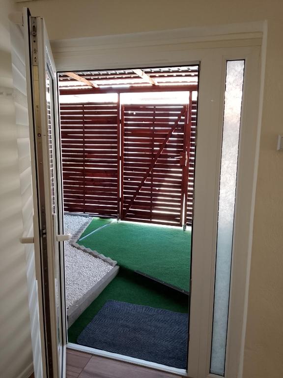 Posteľ alebo postele v izbe v ubytovaní Magnolia apartman