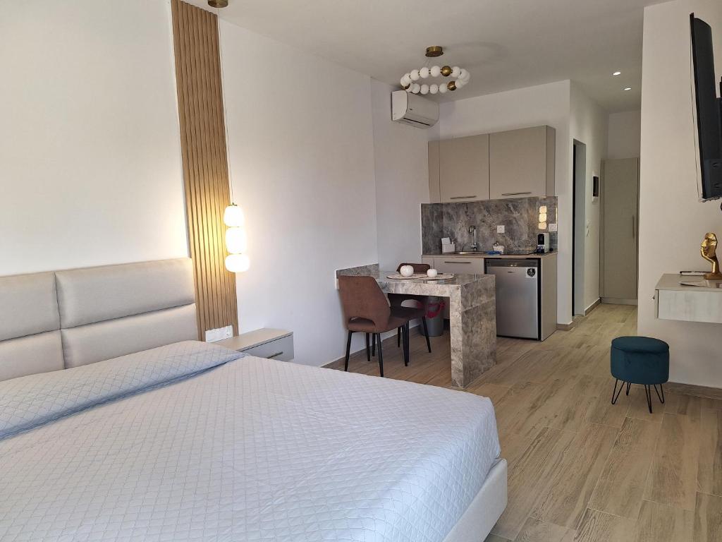 Kuchyň nebo kuchyňský kout v ubytování POUNEDES LUXURY SUITES