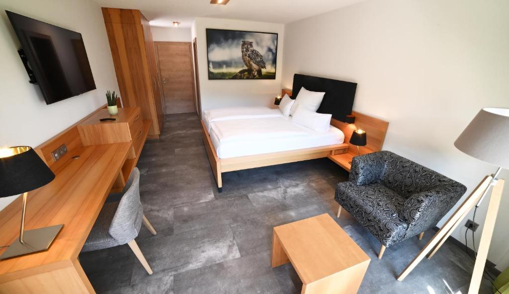 TV a/nebo společenská místnost v ubytování Hotel Fuxxbau