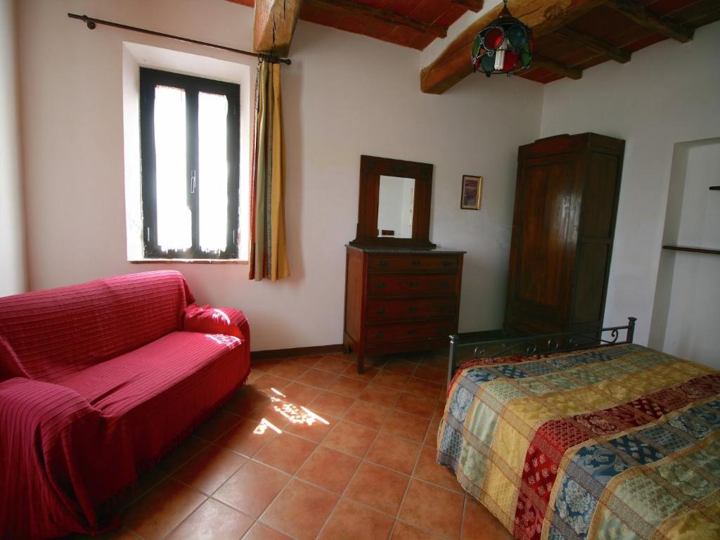 Posteľ alebo postele v izbe v ubytovaní Traditional Farmhouse in Toscana with Swimming Pool