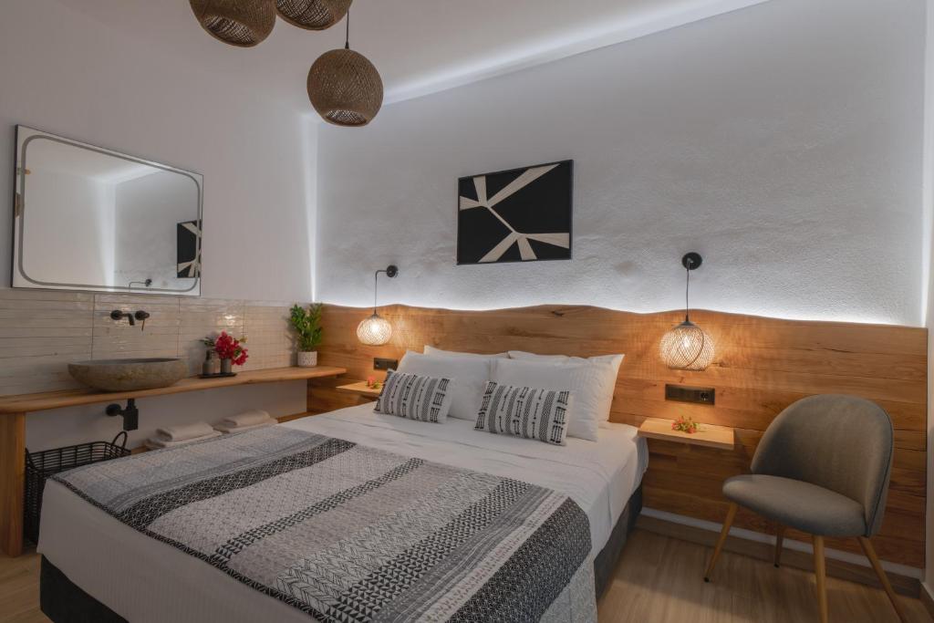 Postel nebo postele na pokoji v ubytování Studios Nelli Alonissos