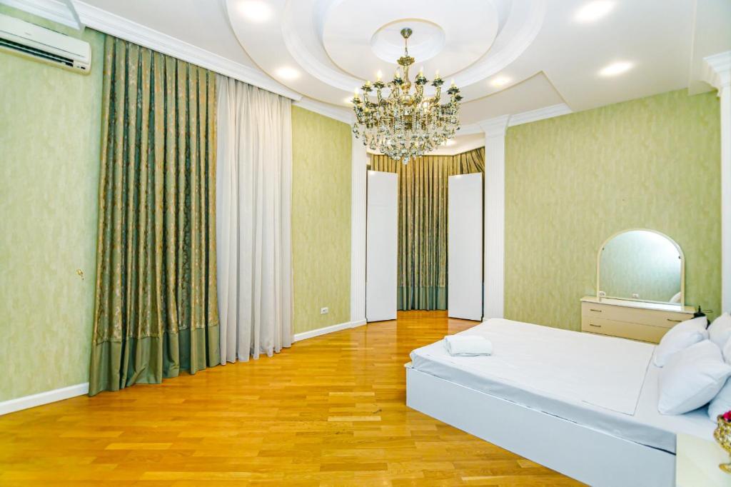 Postel nebo postele na pokoji v ubytování MoonLight House