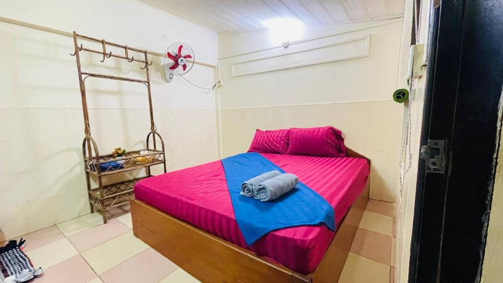 Postel nebo postele na pokoji v ubytování Studebaker Guesthouse