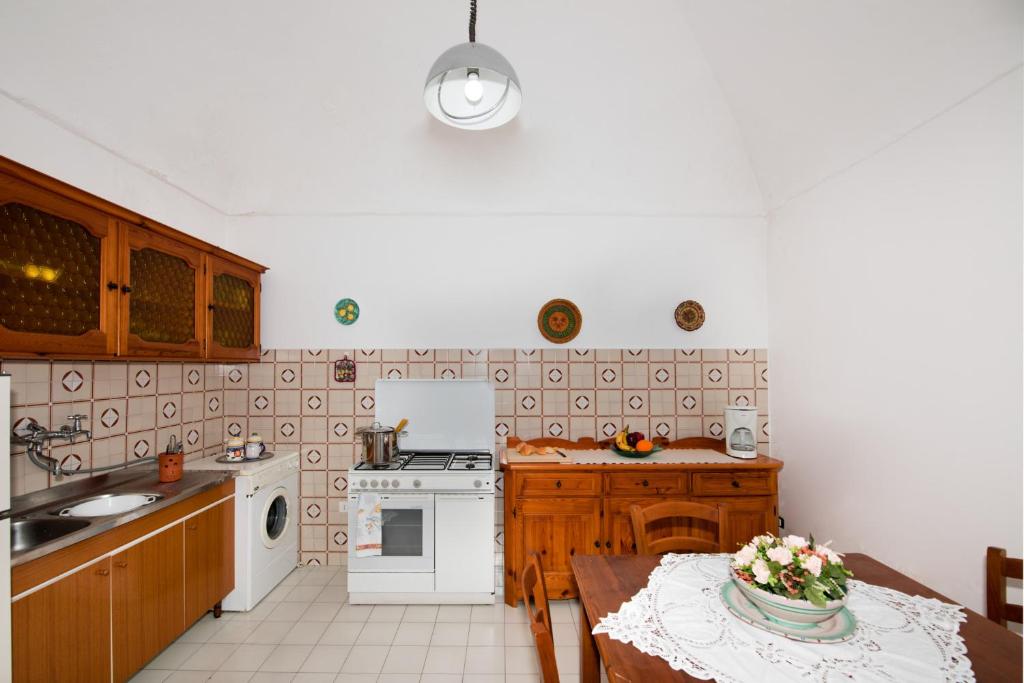 Kuchyň nebo kuchyňský kout v ubytování Villa Setteventi