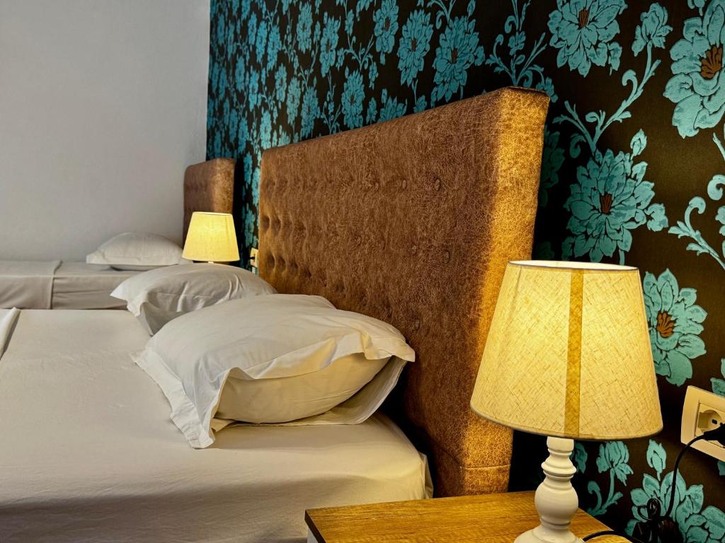 Postel nebo postele na pokoji v ubytování Hotel Globo