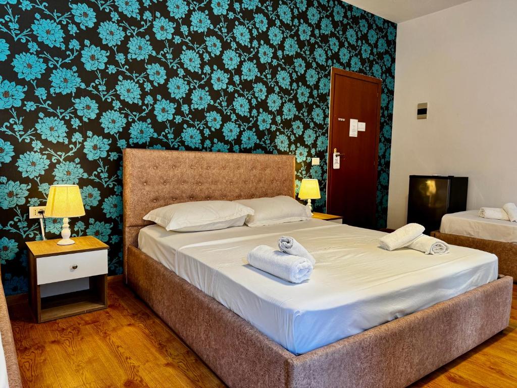 Postel nebo postele na pokoji v ubytování Hotel Globo