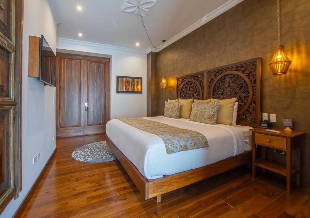 Postel nebo postele na pokoji v ubytování Grand Atlantiis Suite Near Delhi IGI Airport