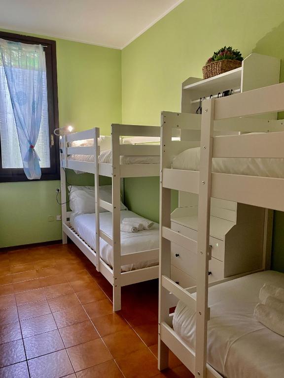 Postel nebo postele na pokoji v ubytování Bnbook - La casa sul Lago Maggiore