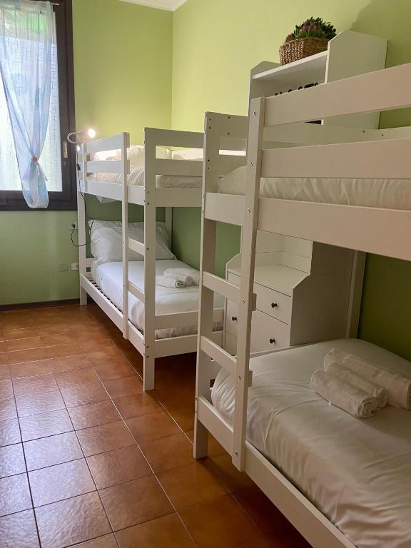 Postel nebo postele na pokoji v ubytování Bnbook - La casa sul Lago Maggiore