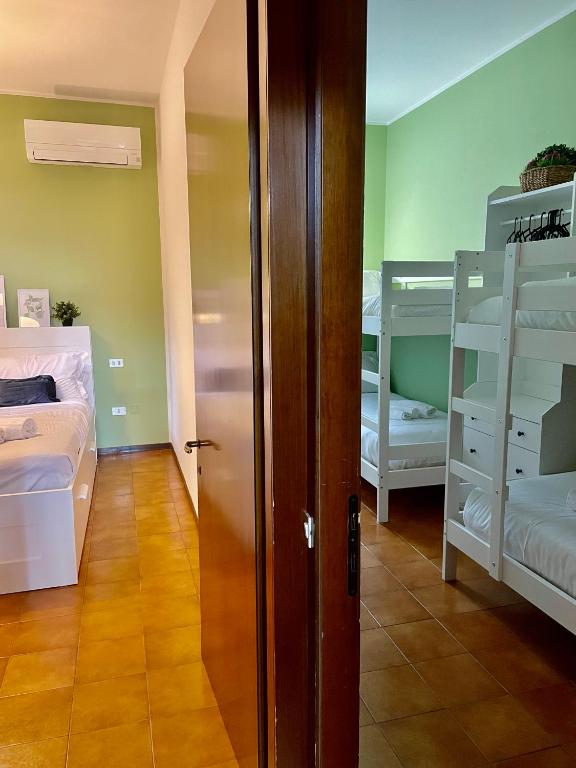 Postel nebo postele na pokoji v ubytování Bnbook - La casa sul Lago Maggiore
