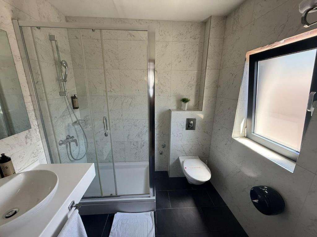 Koupelna v ubytování Hotel VIP