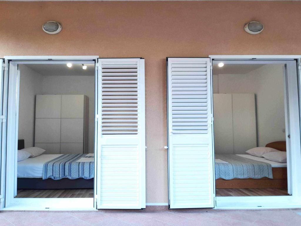 Postel nebo postele na pokoji v ubytování KaLaLe Deluxe - Makarska