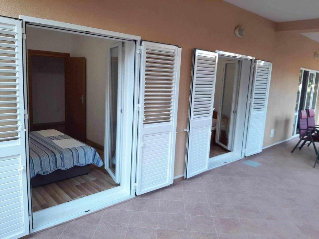 Postel nebo postele na pokoji v ubytování KaLaLe Deluxe - Makarska