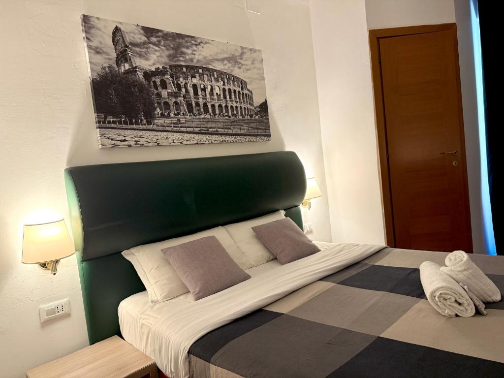 Ліжко або ліжка в номері Grand Gaeta