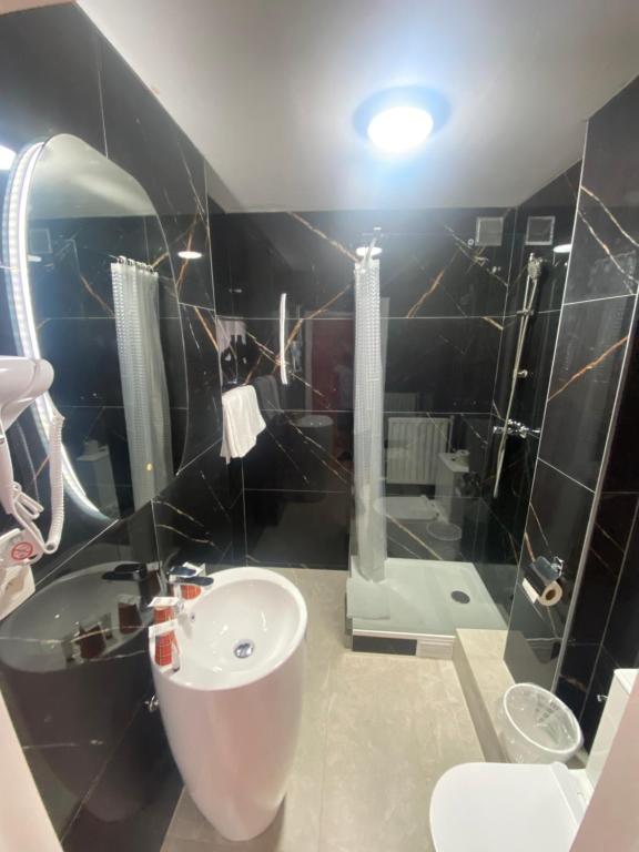 Koupelna v ubytování Hotel Windsor