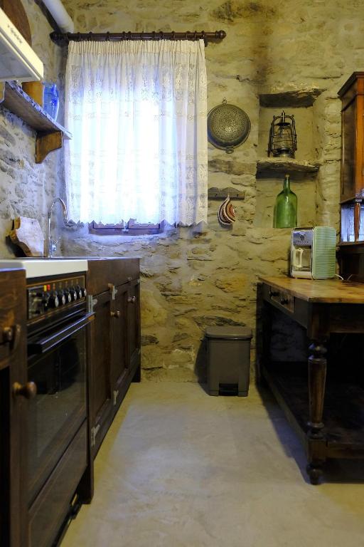 Kuchyň nebo kuchyňský kout v ubytování Hill's Barbacane