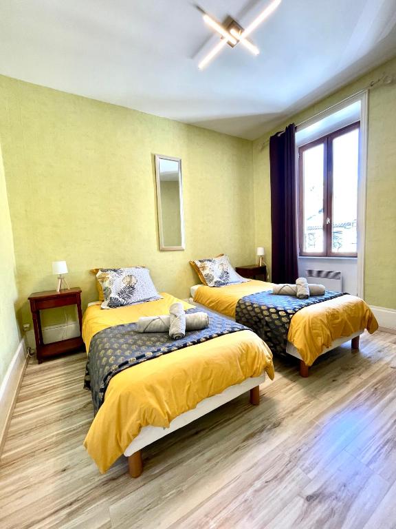 Postel nebo postele na pokoji v ubytování Gîte de la Cigale