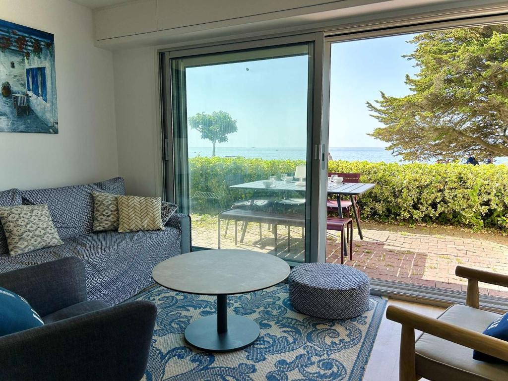 Posedenie v ubytovaní La Baule Appartement 3 pièces avec terrasse, proche commerces et plage - FR-1-245-170
